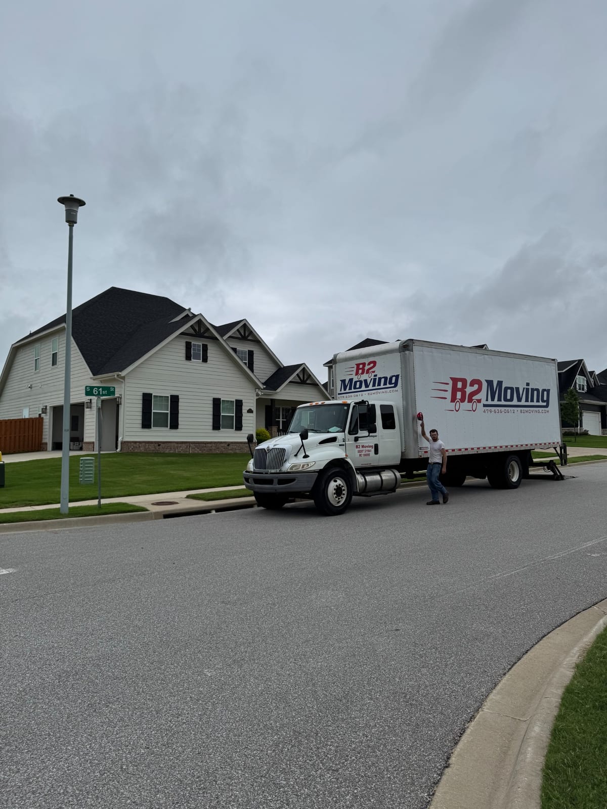 B2 Moving truck outside a Cave Springs home during a local move